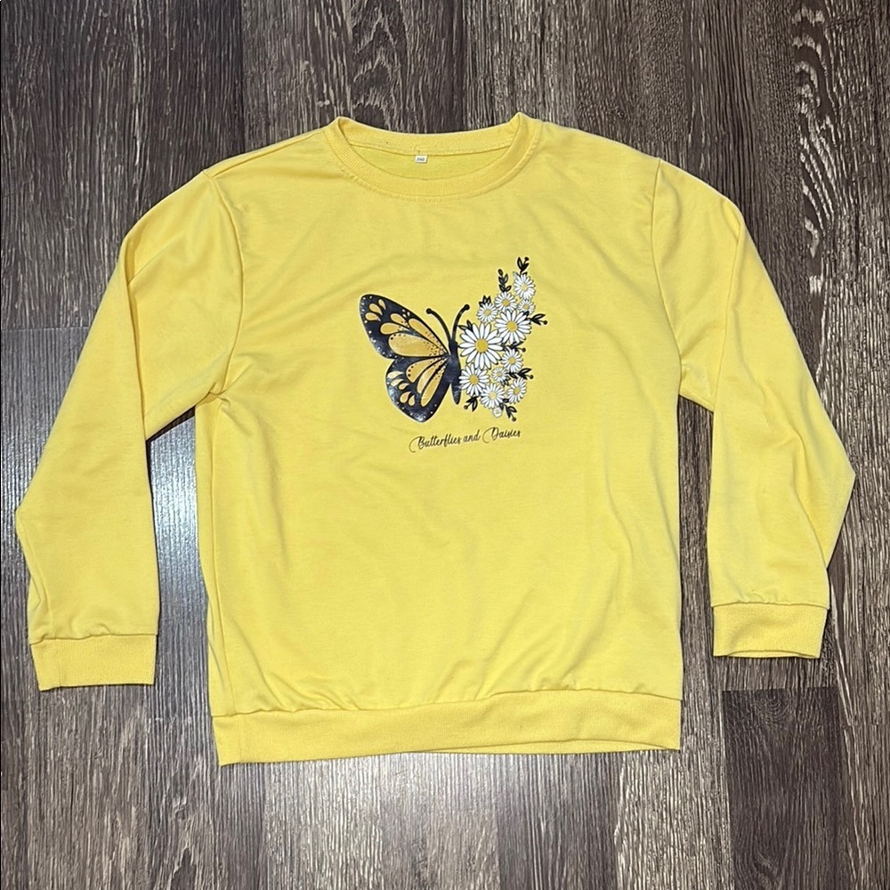 Girls bright yellow sweatshirt with butterfly and daisies on it Size youth large